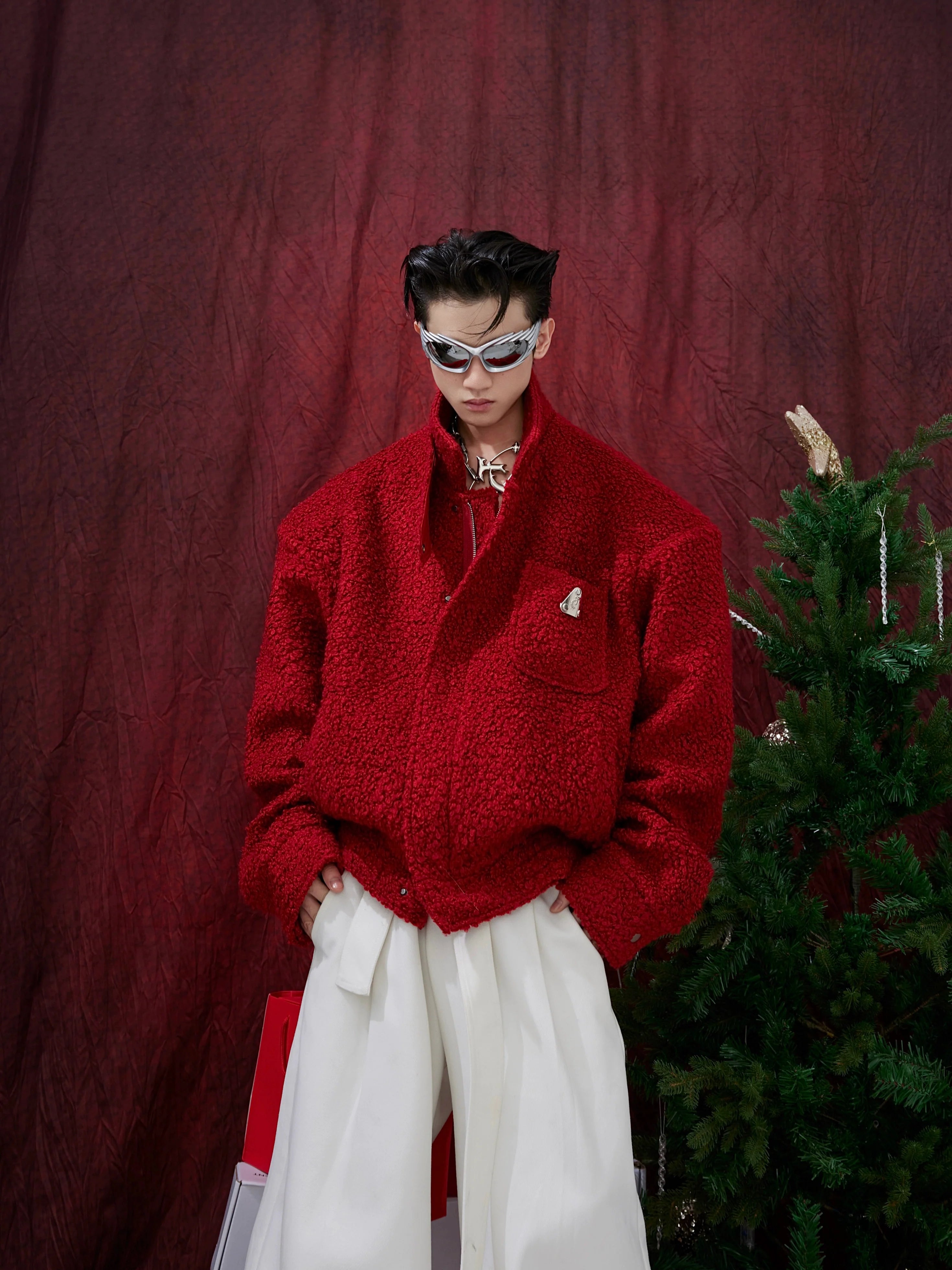 Oversized cropped wool jacket with textured fabric, perfect for streetwear fashion with deconstructed design details