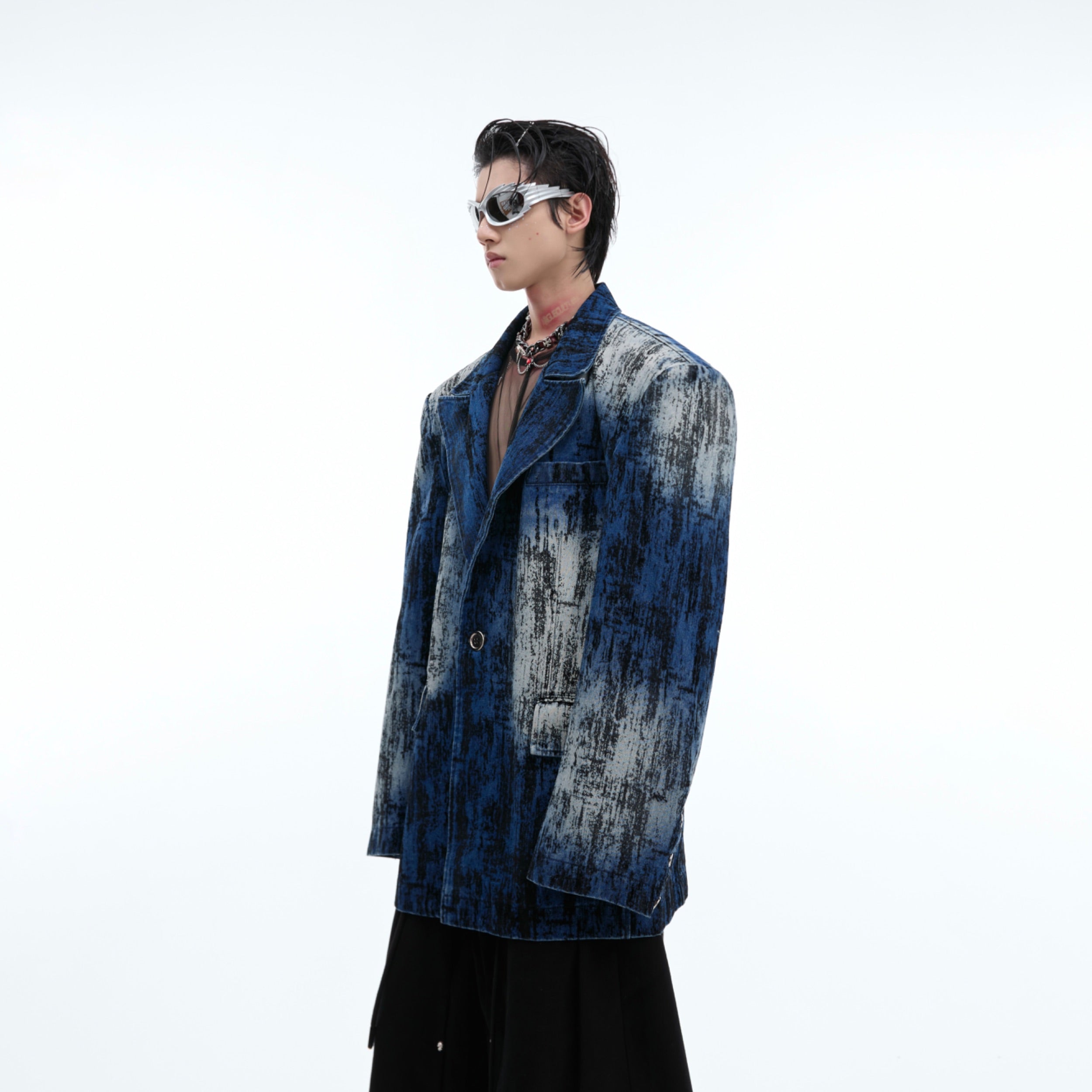 Front view of vintage tie-dye distressed denim blazer with raw-edge details and unique spray-dye pattern