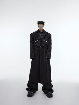 Close-up of the innovative layering details on this fashion-forward deconstructed long trench coat