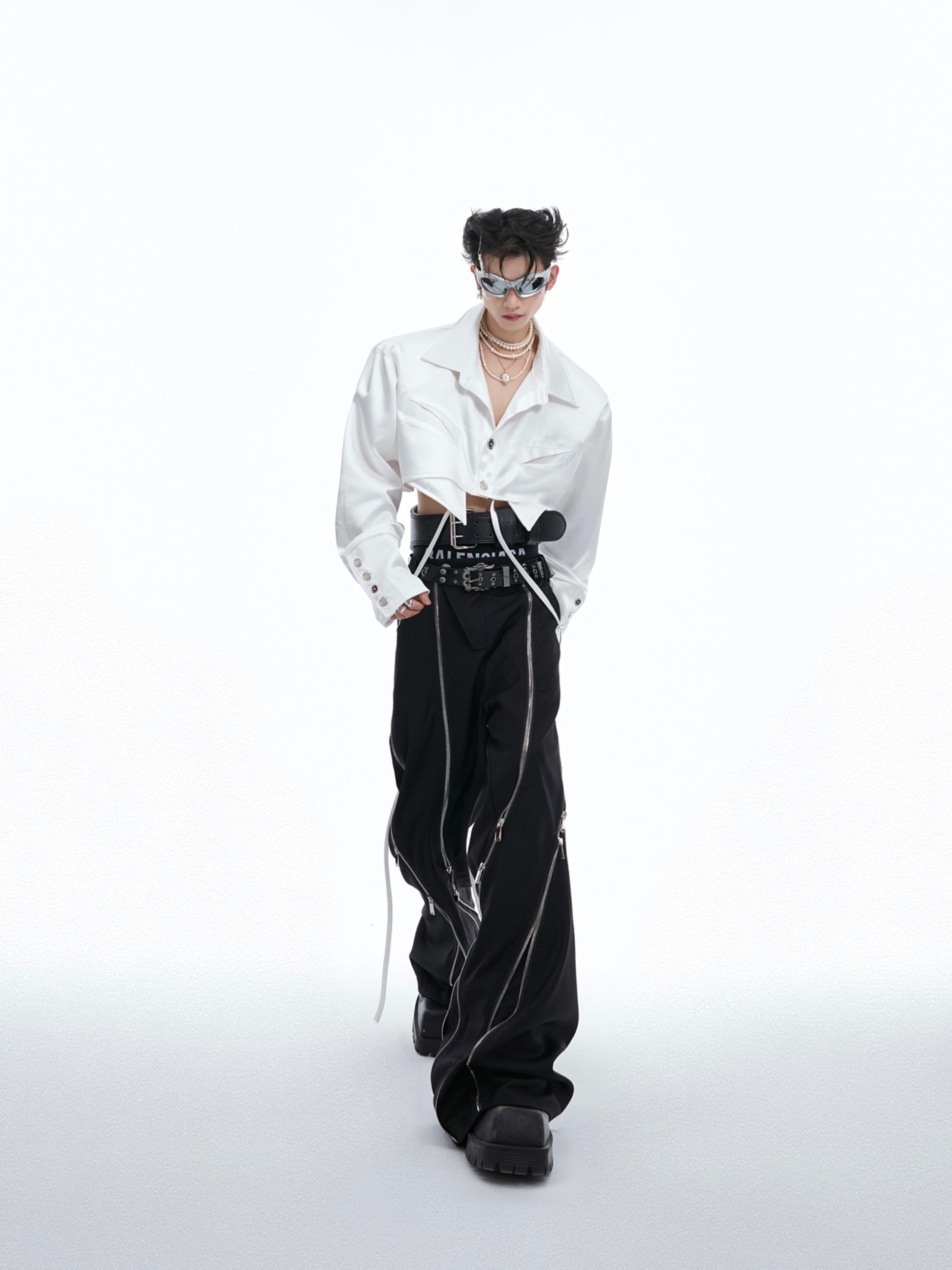 Edgy deconstructed satin shirt with unique button-up design and drop shoulder silhouette