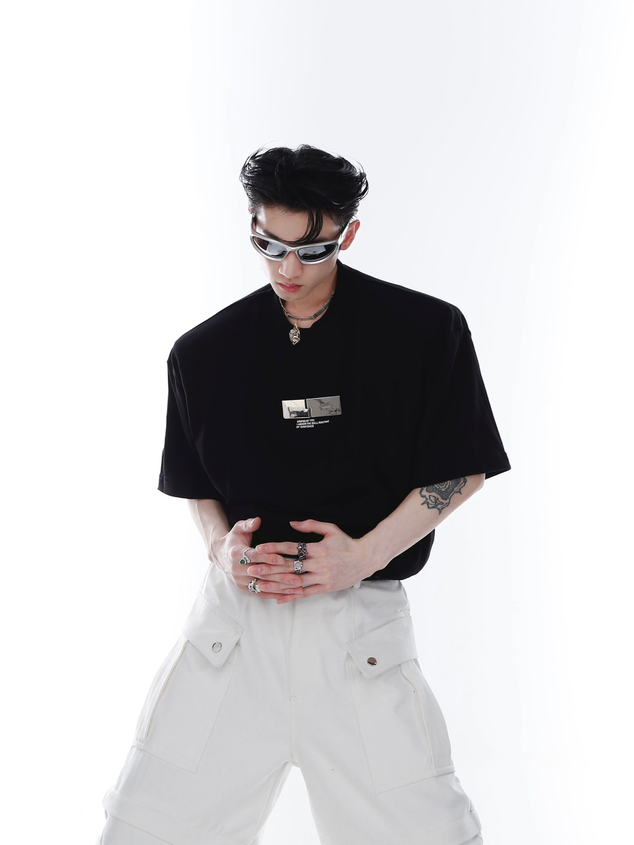 Close-up of the three-dimensional advanced cutting on this unisex streetwear tee showing architectural silhouette