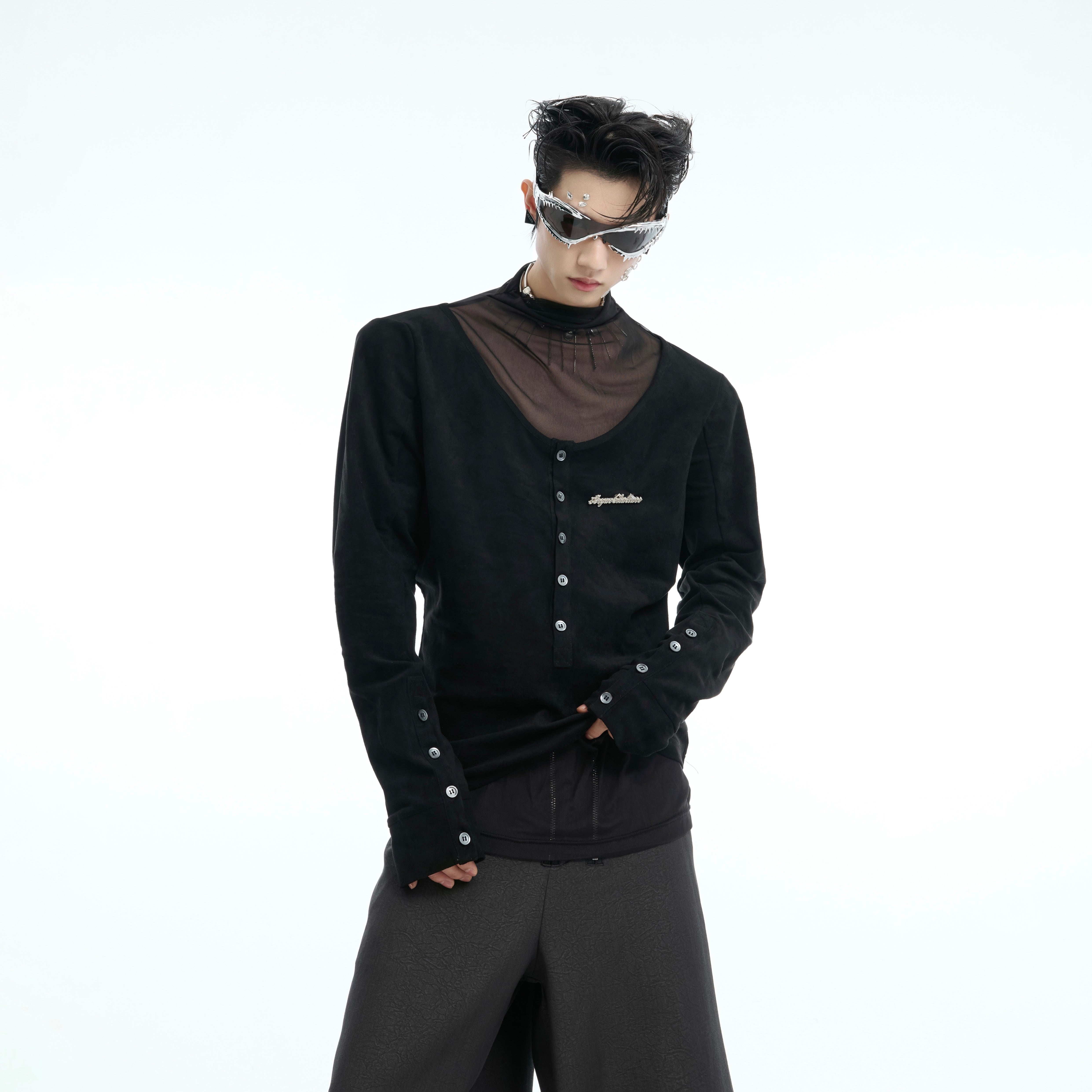 Front view of deconstructed long sleeve tee showing avant-garde patchwork design and button-up streetwear style