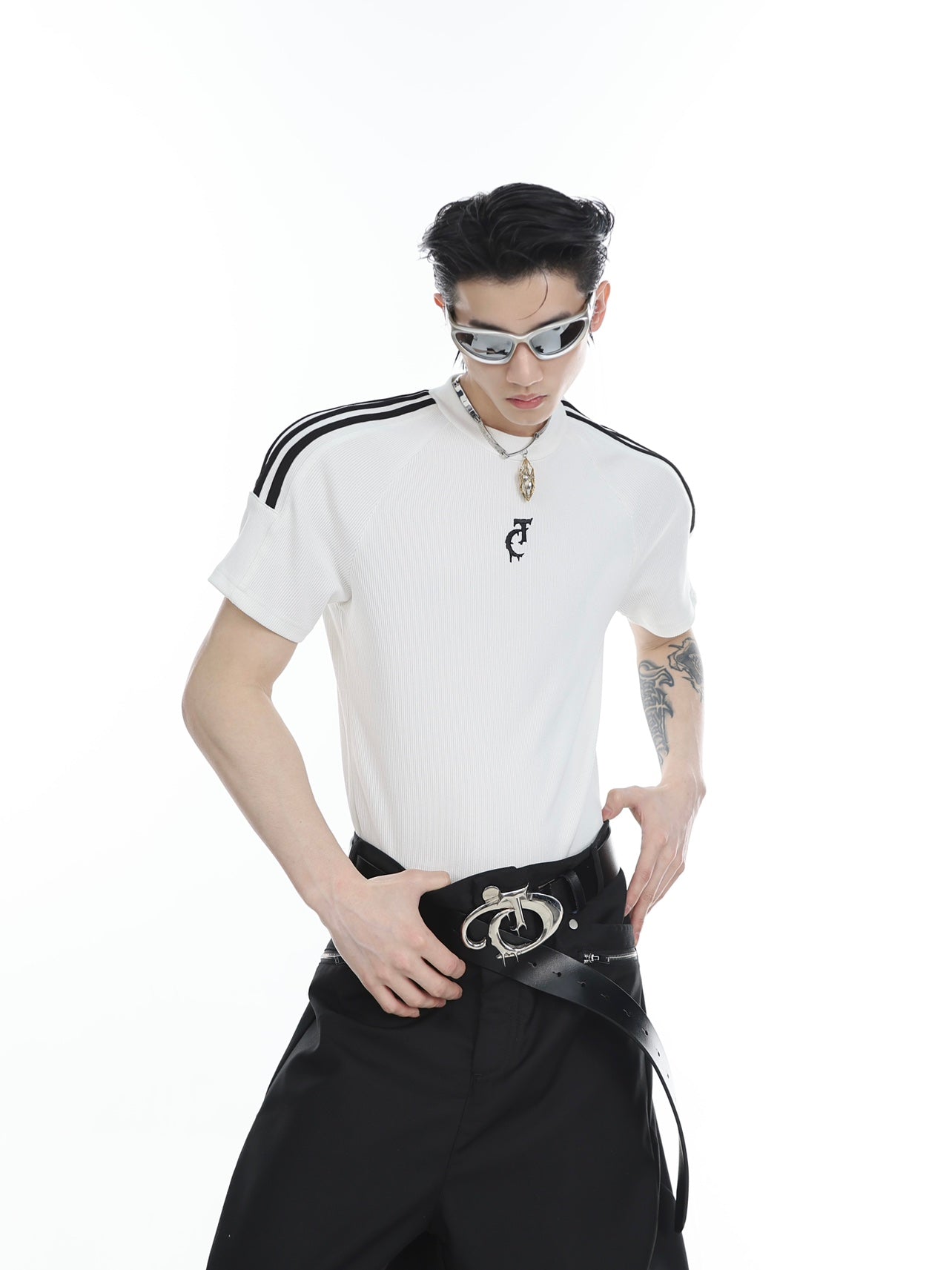 Edgy unisex streetwear top with sharp architectural lines and genderless striped design for summer