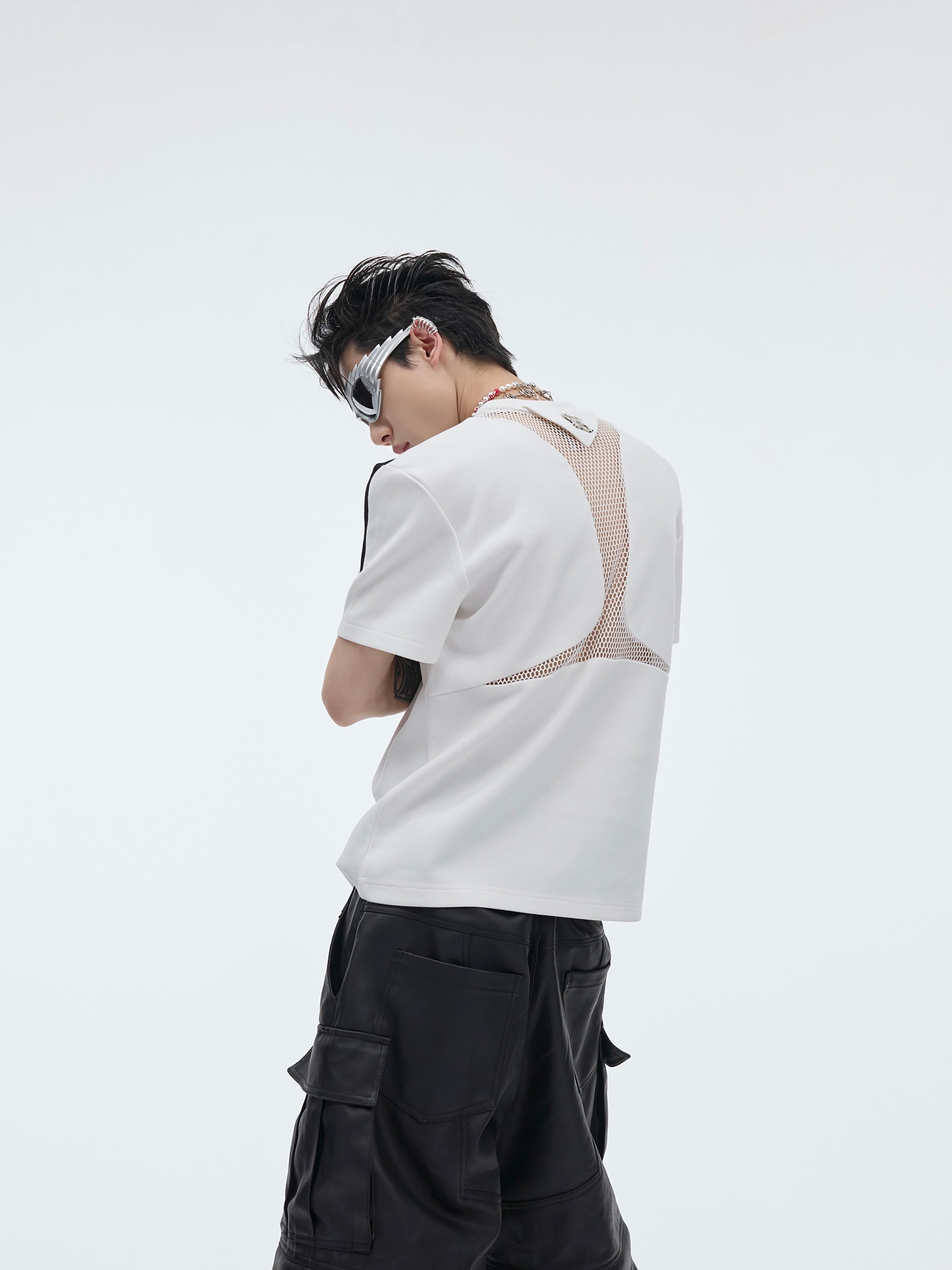 Breathable polyester blend sleeveless tee with deconstructed neckline for summer wear