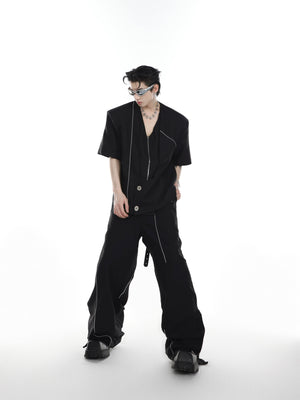 Model wearing the streetwear-inspired blazer set showing the padded shoulder construction