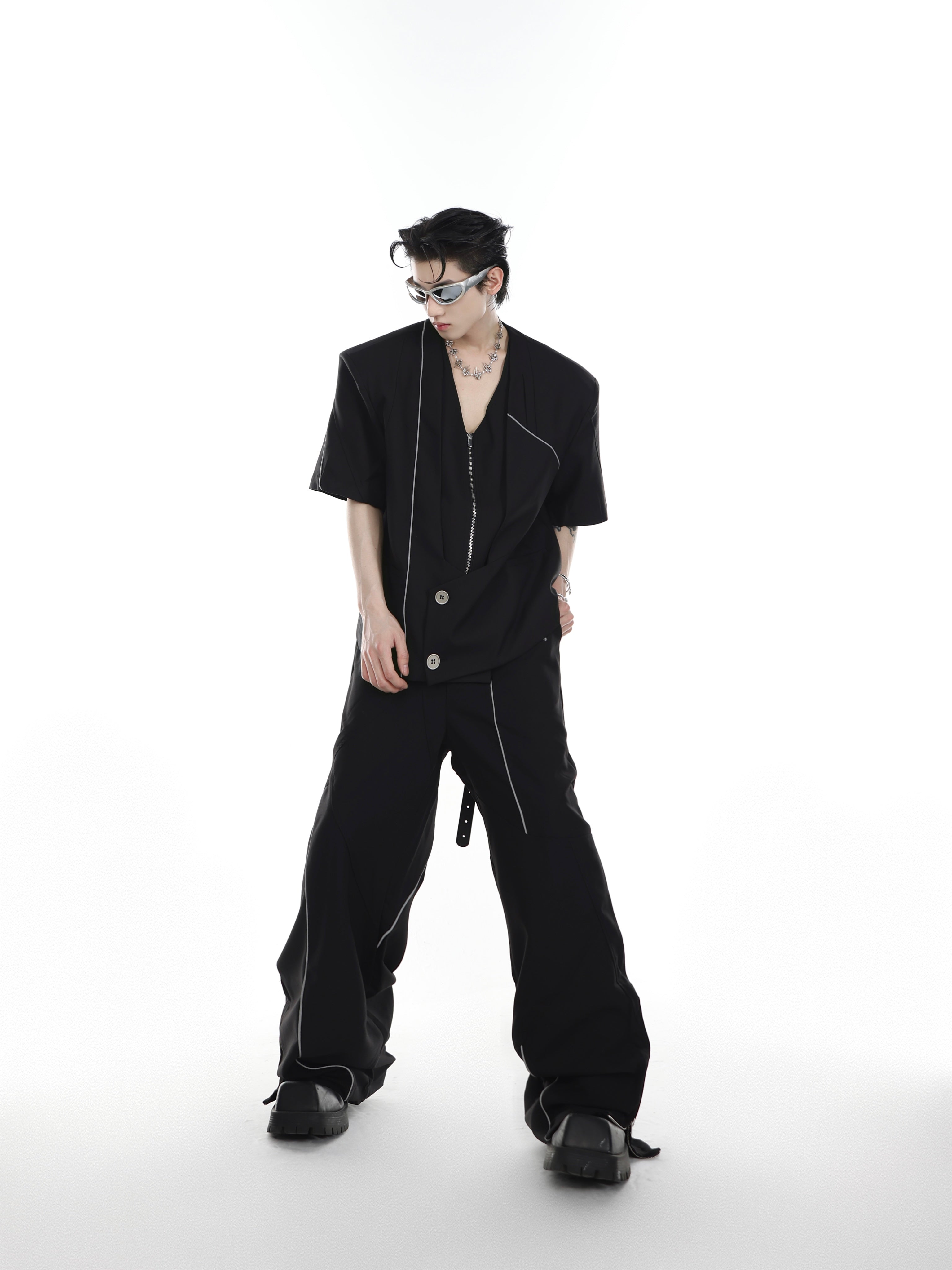 Model wearing the streetwear-inspired blazer set showing the padded shoulder construction