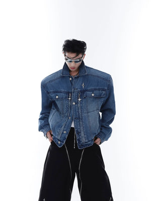 Vintage washed denim jacket with cropped oversized fit and metal zipper, showcasing avant-garde streetwear style