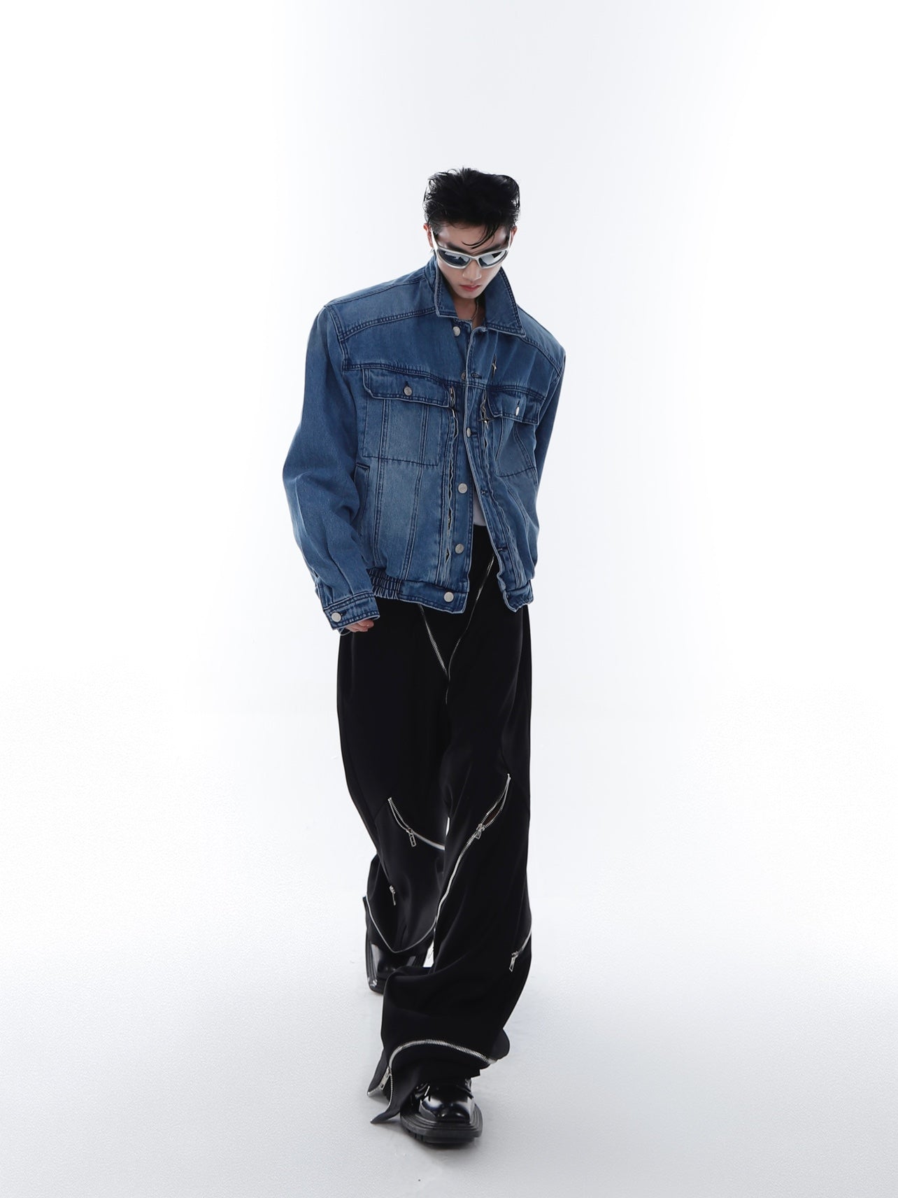 Detailed shot of the sleeve construction on this high-quality vintage washed denim jacket