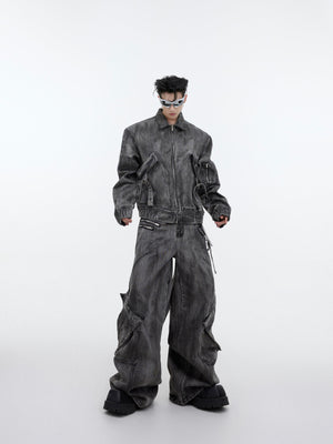 Vintage distressed denim set featuring zippered jacket and cargo pants with retro wash and edgy metal hardware
