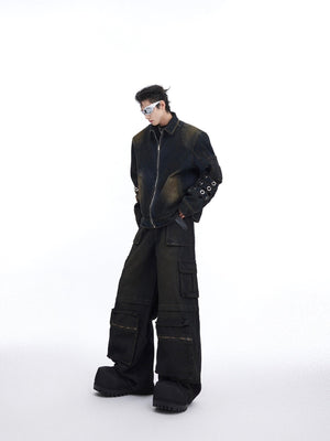 Vintage distressed denim zip-up jacket with patchwork details and metal accents for urban streetwear style
