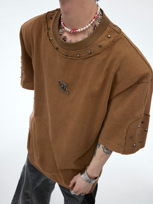 Close-up of the soft washed cotton fabric and distressed details on this oversized vintage-inspired t-shirt