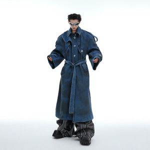 Front view of vintage-wash deconstructed denim coat showing oversized streetwear style and distressed details