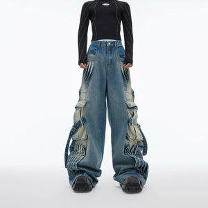 Vintage washed distressed cargo jeans with streetwear aesthetic, featuring utility pockets and punk-rock details