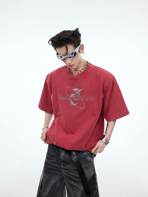 Vintage washed graphic t-shirt with distressed shoulder detail and deconstructed glitter print streetwear design