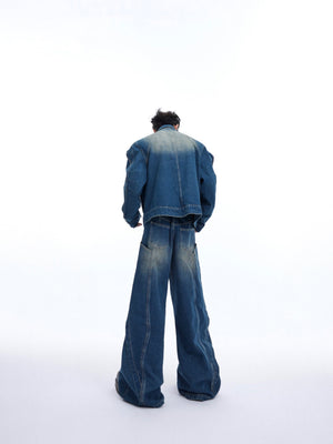 Vintage wide leg denim pants with deconstructed details and artisanal stone wash fading