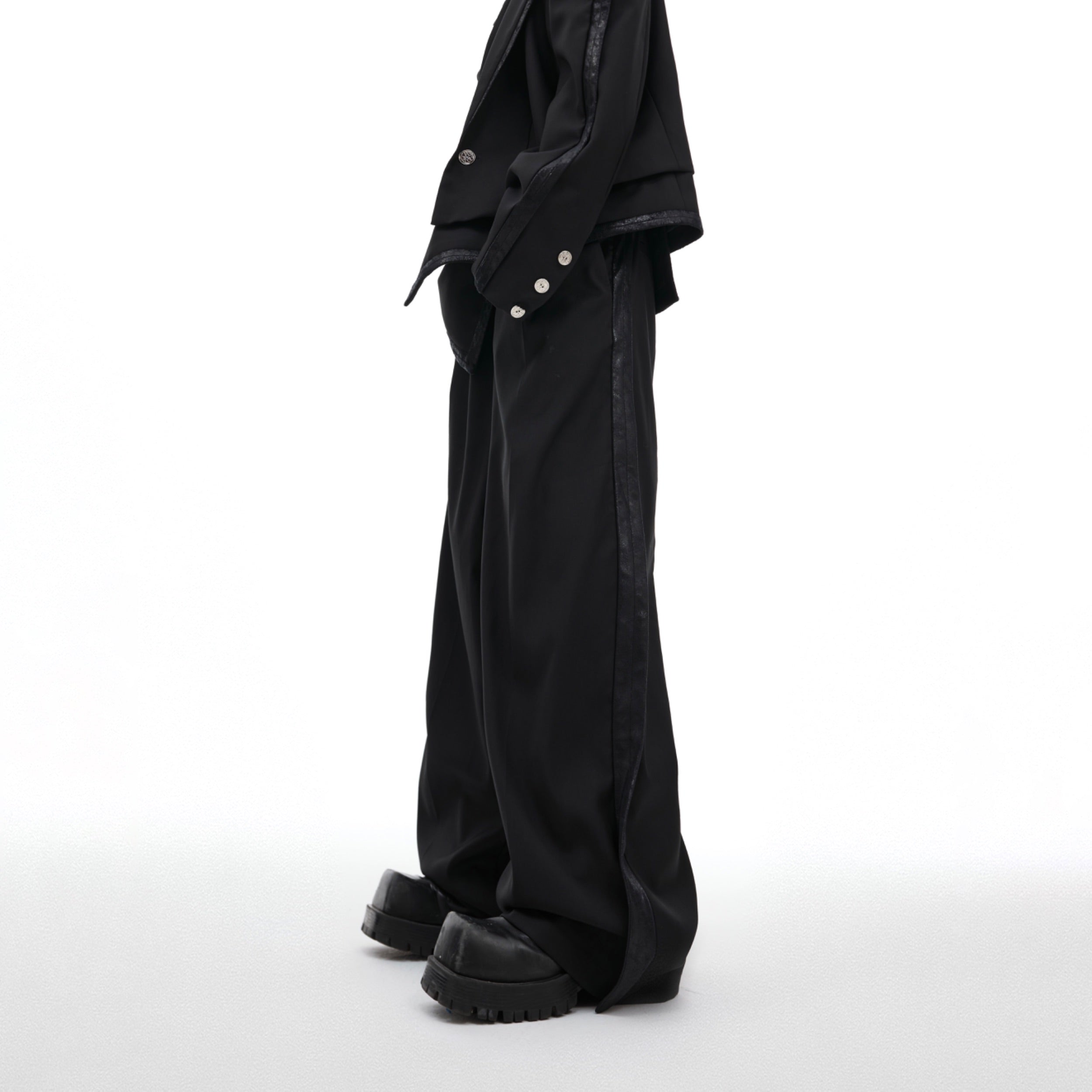 Stylish wide-leg pants from the deconstructed suit set creating a bold streetwear statement