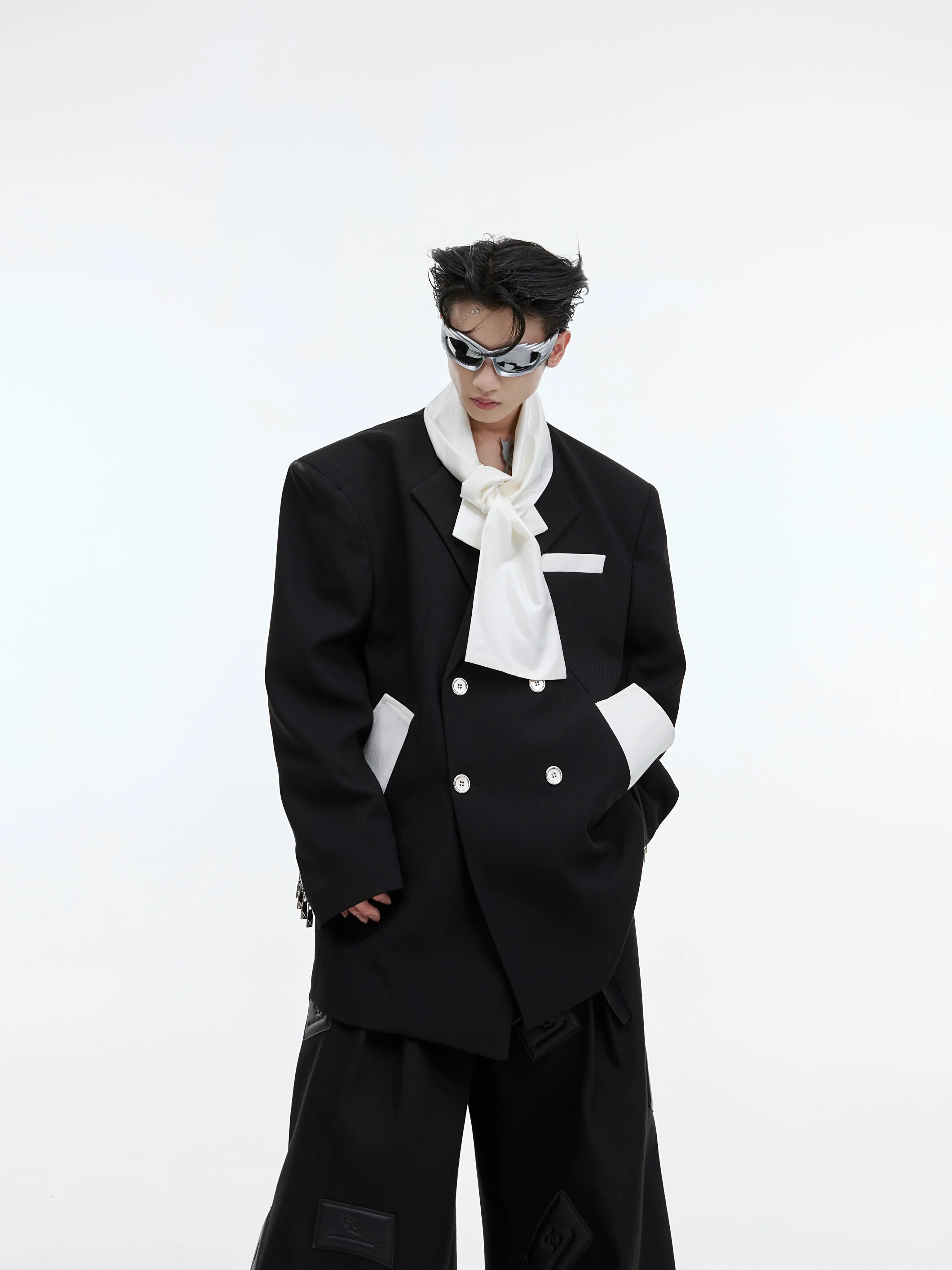 Men's deconstructed wool blazer featuring innovative color-block tie collar design for streetwear style
