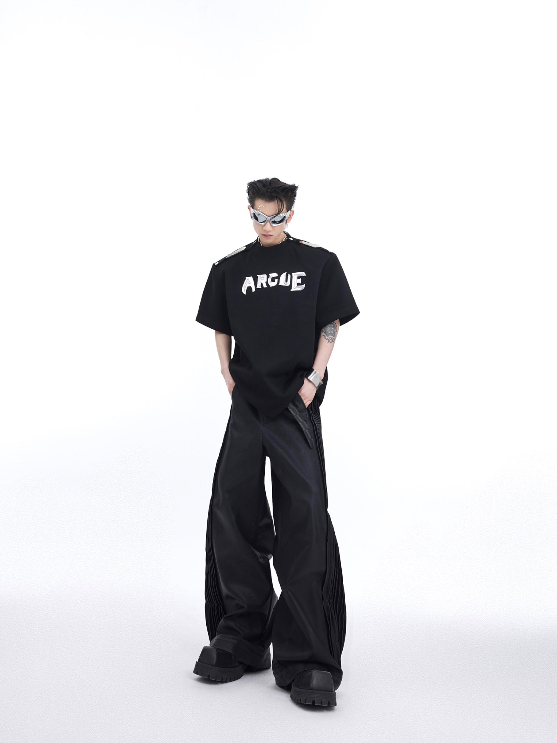 Side angle showing the relaxed fit and breathable fabric of this deconstructed streetwear summer top