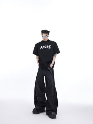 Side angle showing the relaxed fit and breathable fabric of this deconstructed streetwear summer top