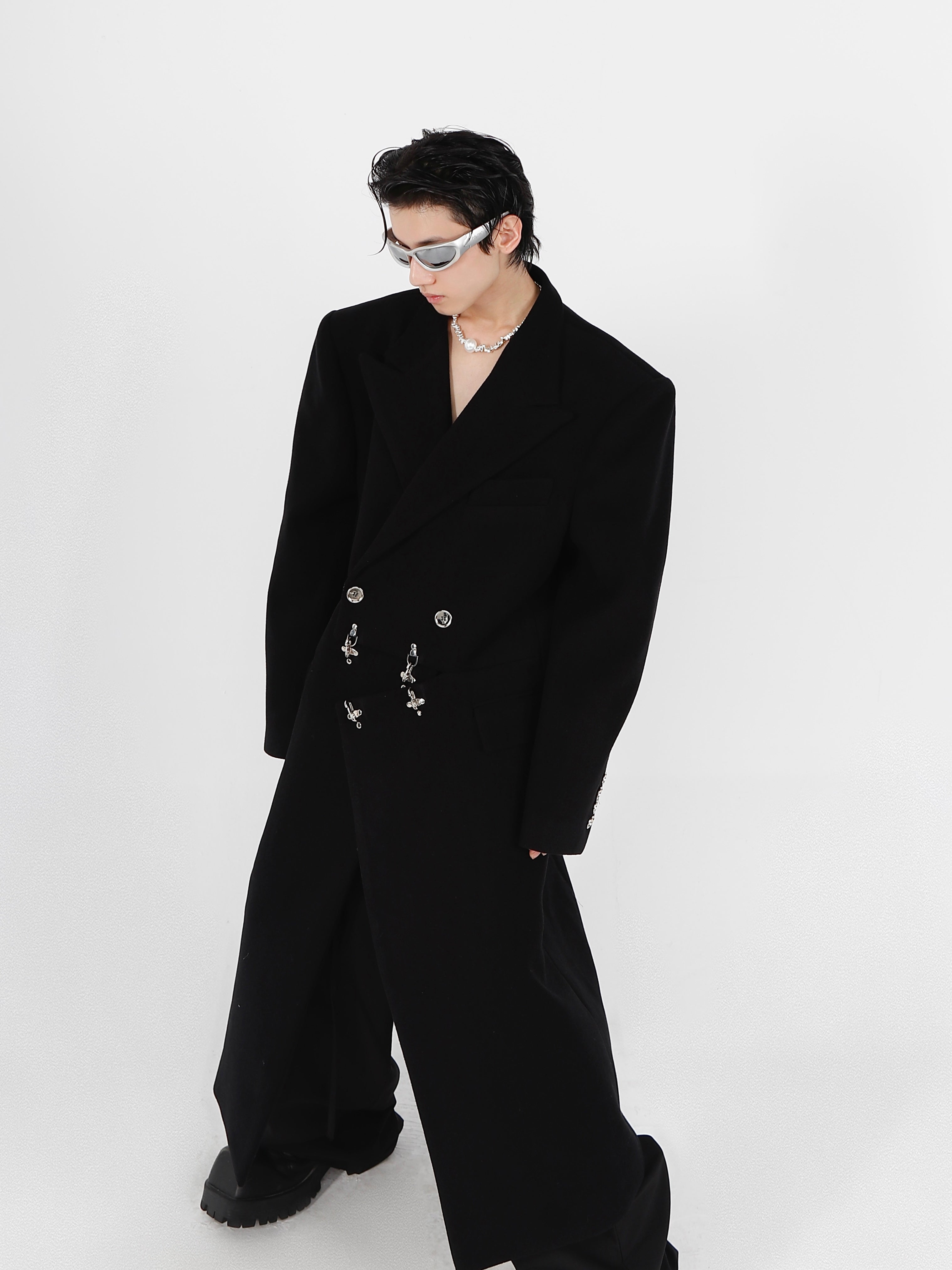 Side profile of high-end polyester coat with wrinkle-free treatment and modern deconstructed design elements