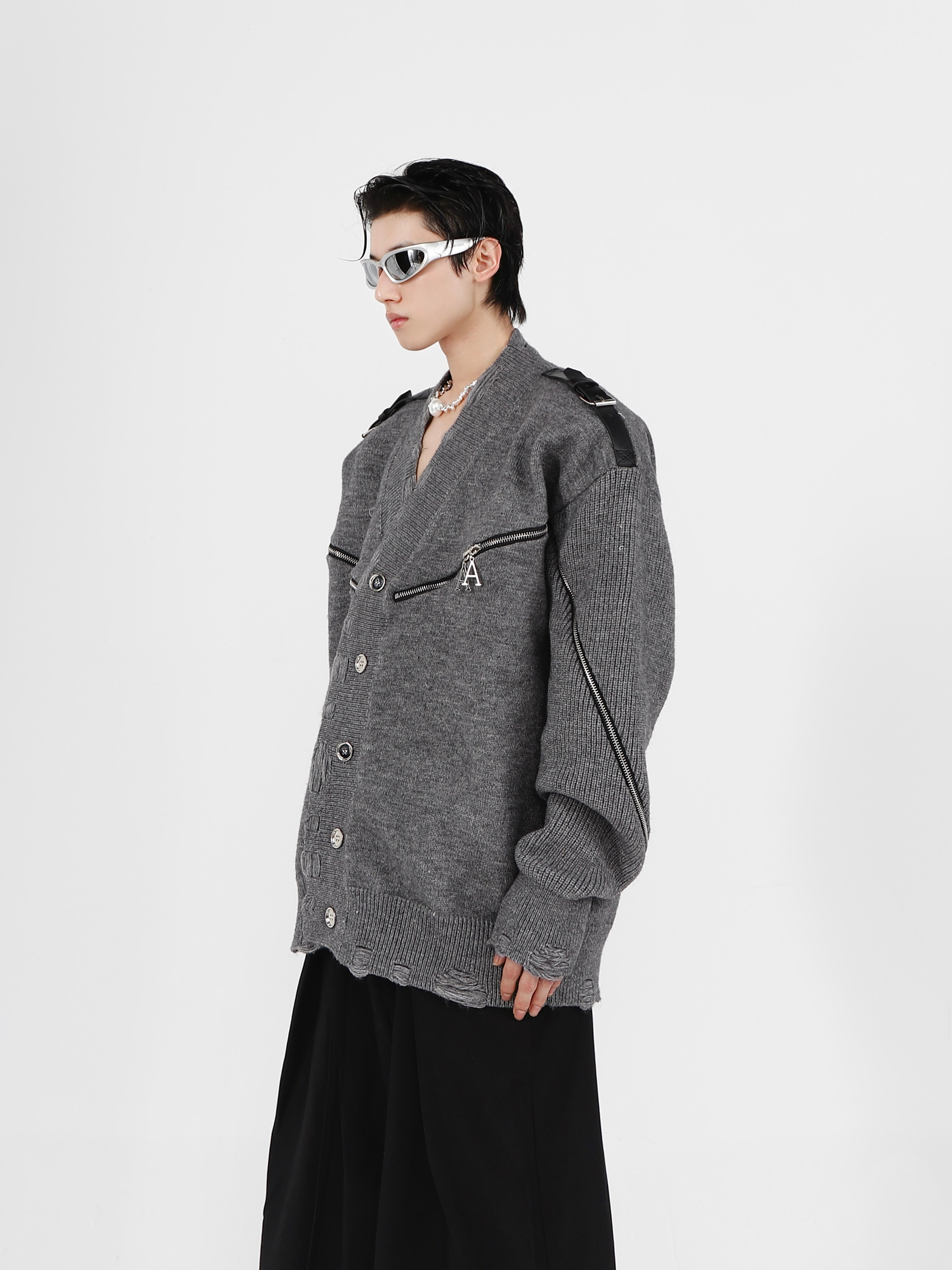 Front view of wrinkle-resistant zip-up cardigan showing the signature metal zipper and deconstructed v-neck design