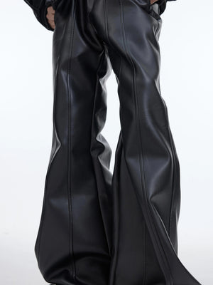 Side view of slim fit flared leather trousers showing the high waist cut