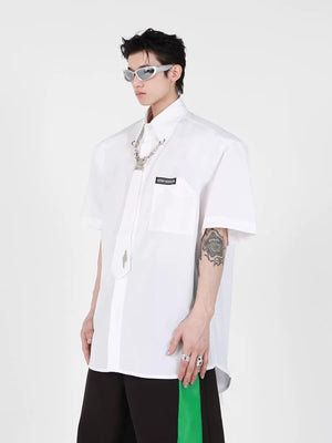Close up of industrial metal clip on a white cotton shirt