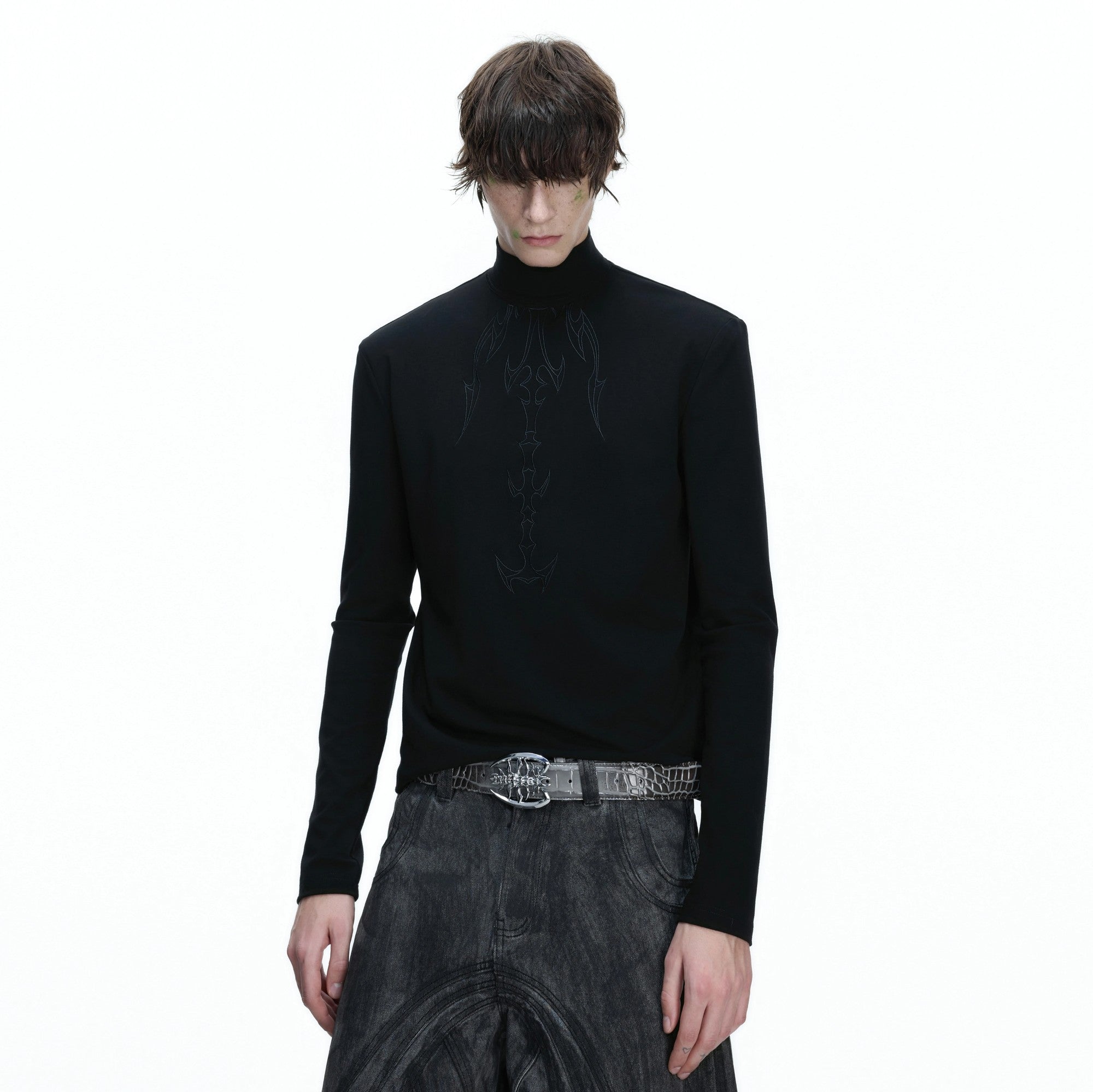 Back view of white streetwear tee showing spine embroidery