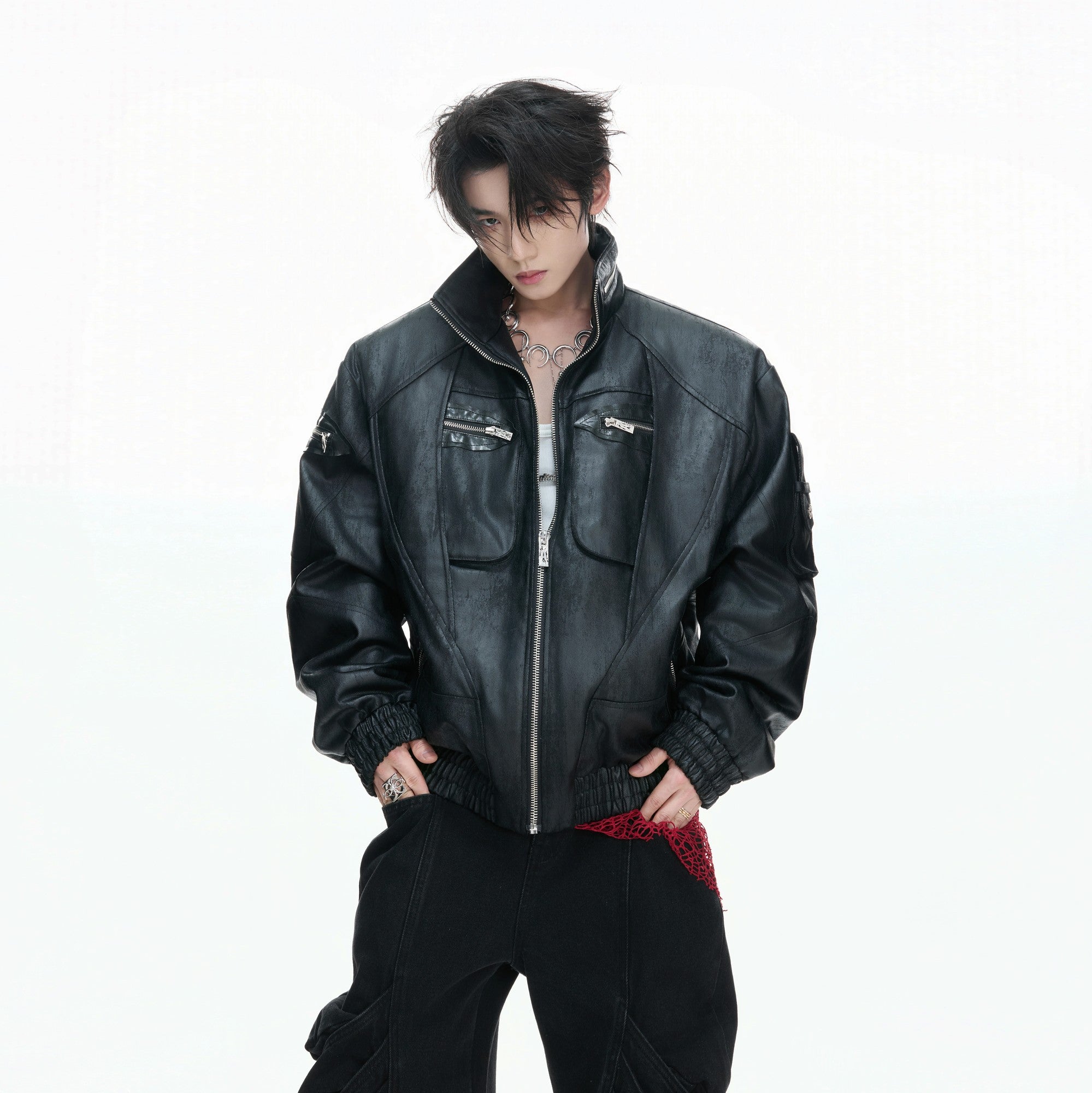 Front view of black distressed oil-waxed vegan leather jacket with multi-zippers