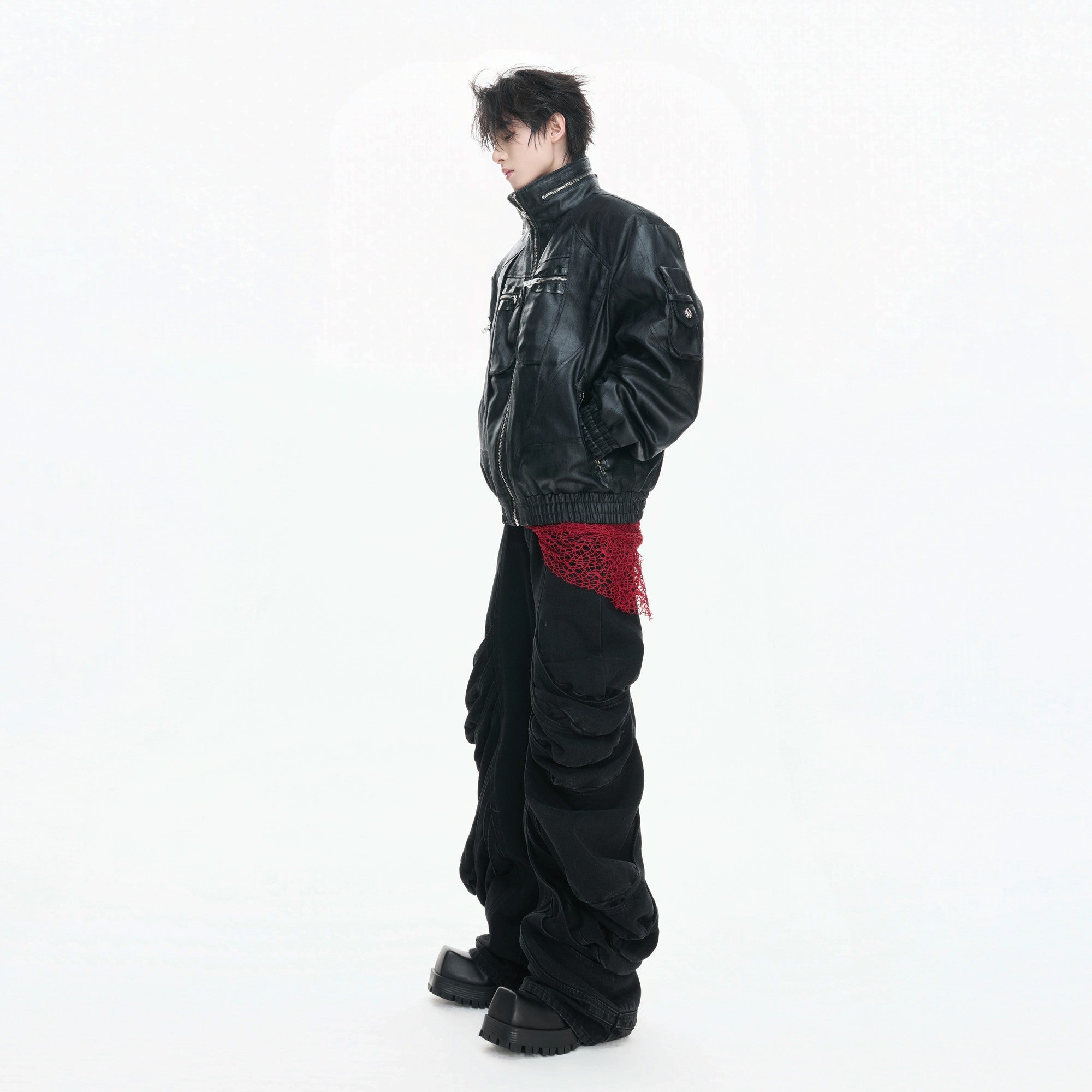 Side view showing the deconstructed design and stand collar of the jacket