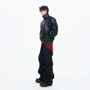 Side view showing the deconstructed design and stand collar of the jacket