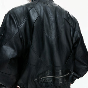 Back view of the heavyweight deconstructed moto jacket showing its loose fit