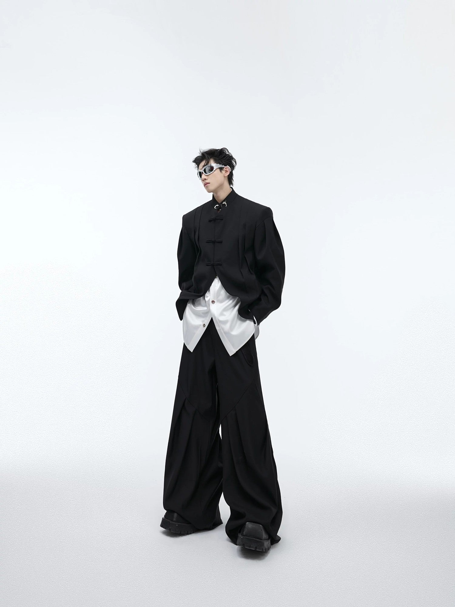 Model wearing a loose fit Neo-Chinese blazer in a street setting