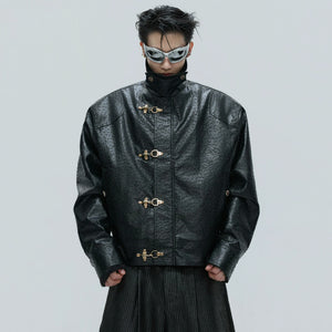 Black ostrich texture leather jacket with silver airplane buckles and fur lining.