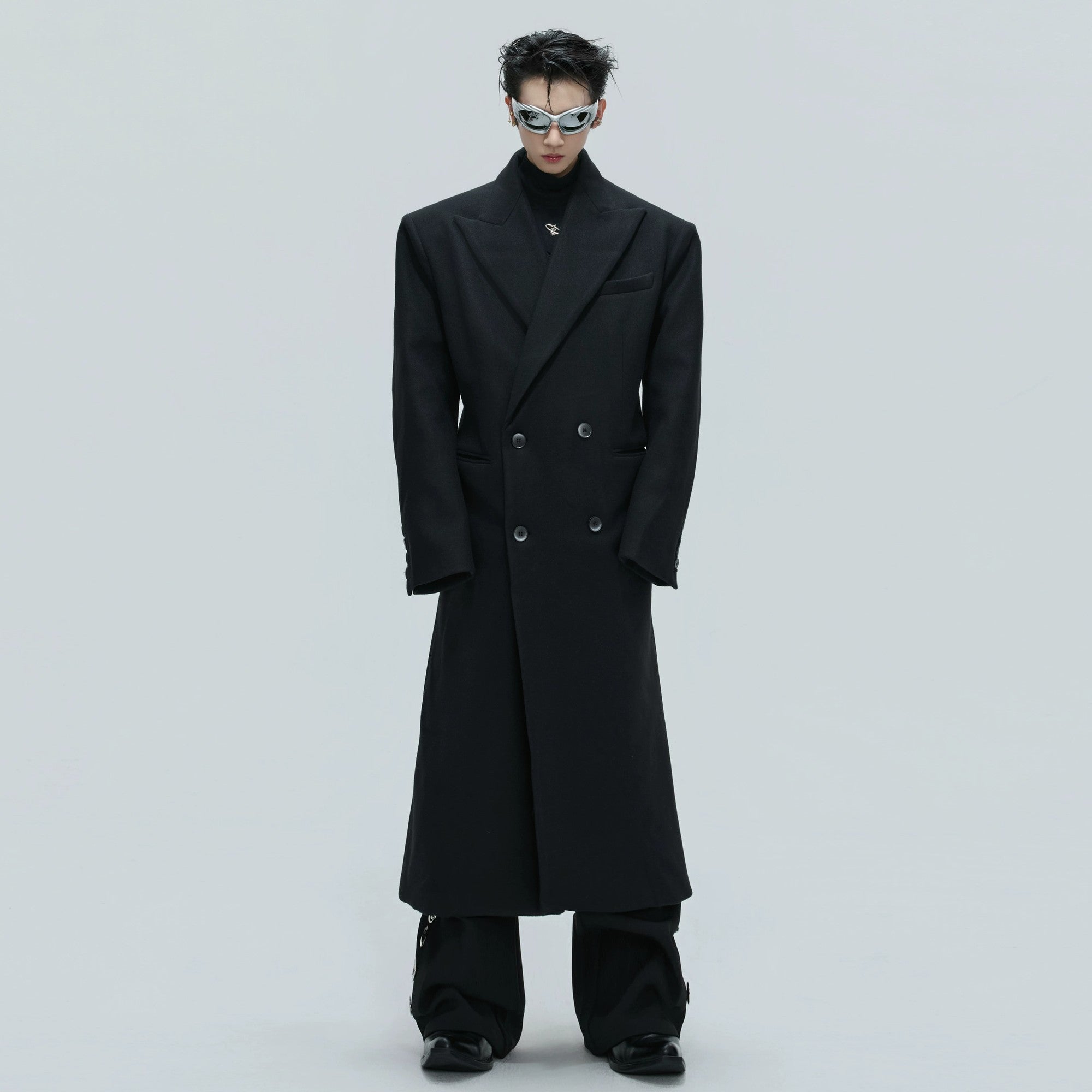 Full-length view of the long deconstructed wool coat for men