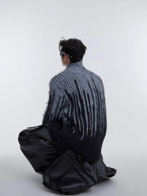 Side view showing the loose fit and dropped shoulder design