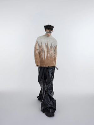 Street style model wearing the baggy mohair sweater in a city setting