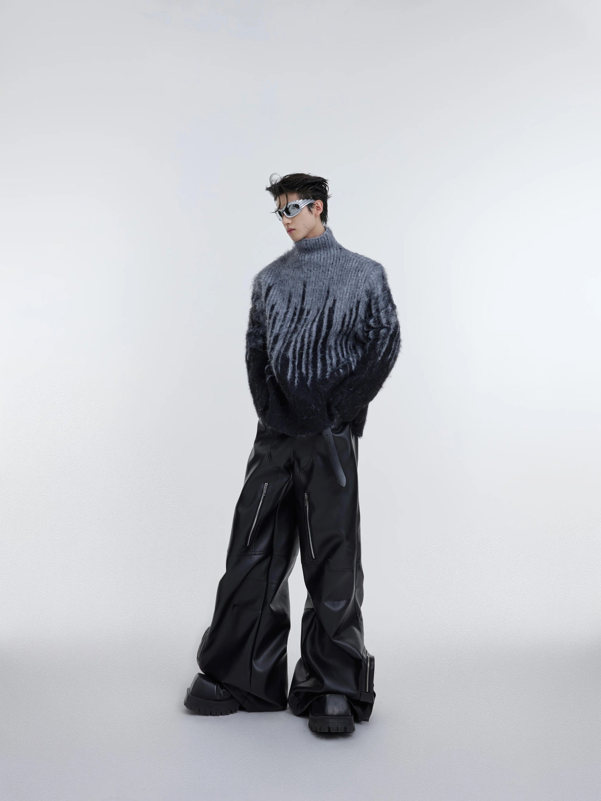 Back view of the oversized geometric striped sweater for men and women