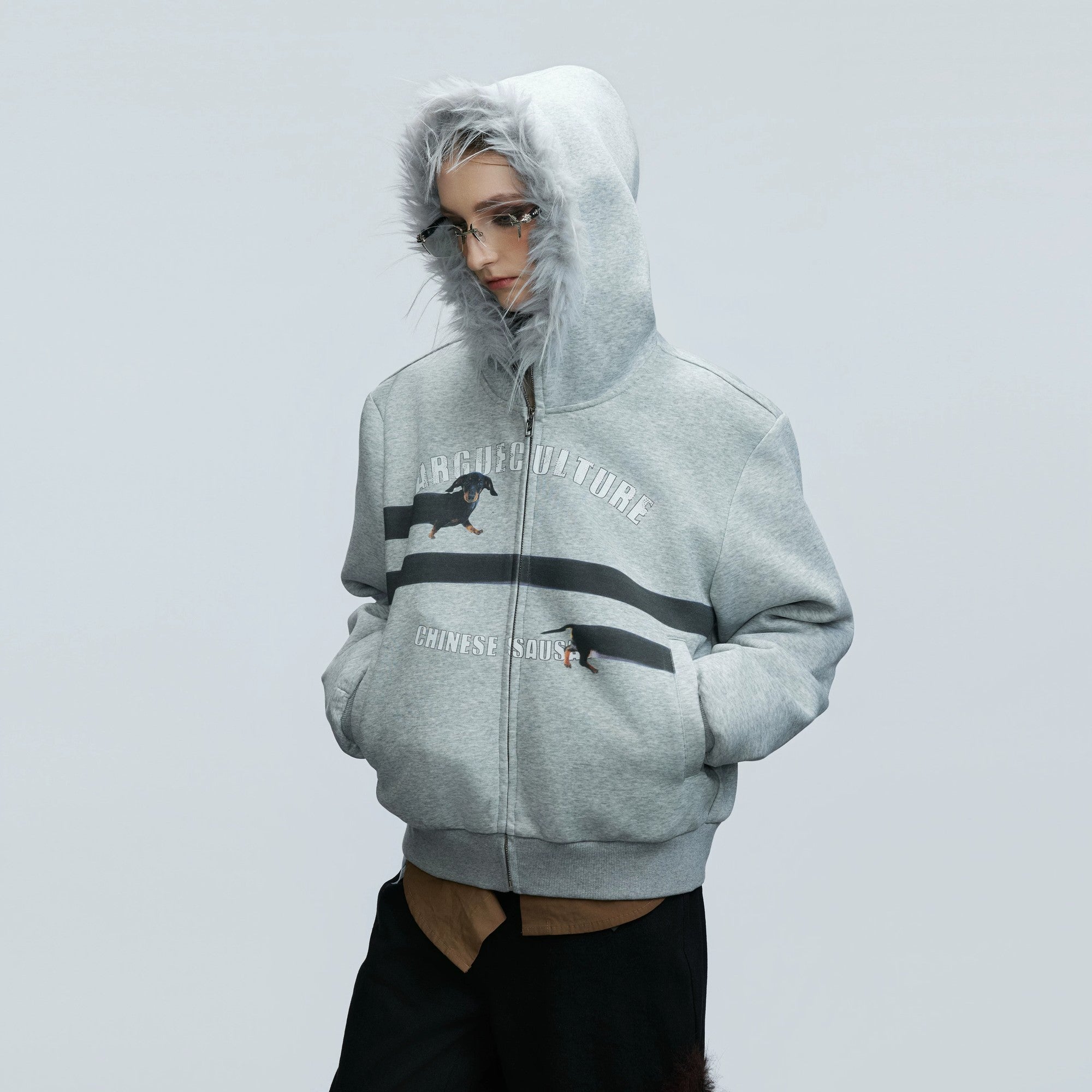 Front view of oversized dachshund print zip-up hoodie with fur collar