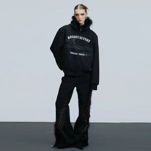 Street style model wearing the dachshund graphic hooded cardigan