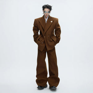 Front view of gray deconstructed wool blazer with cinched waist