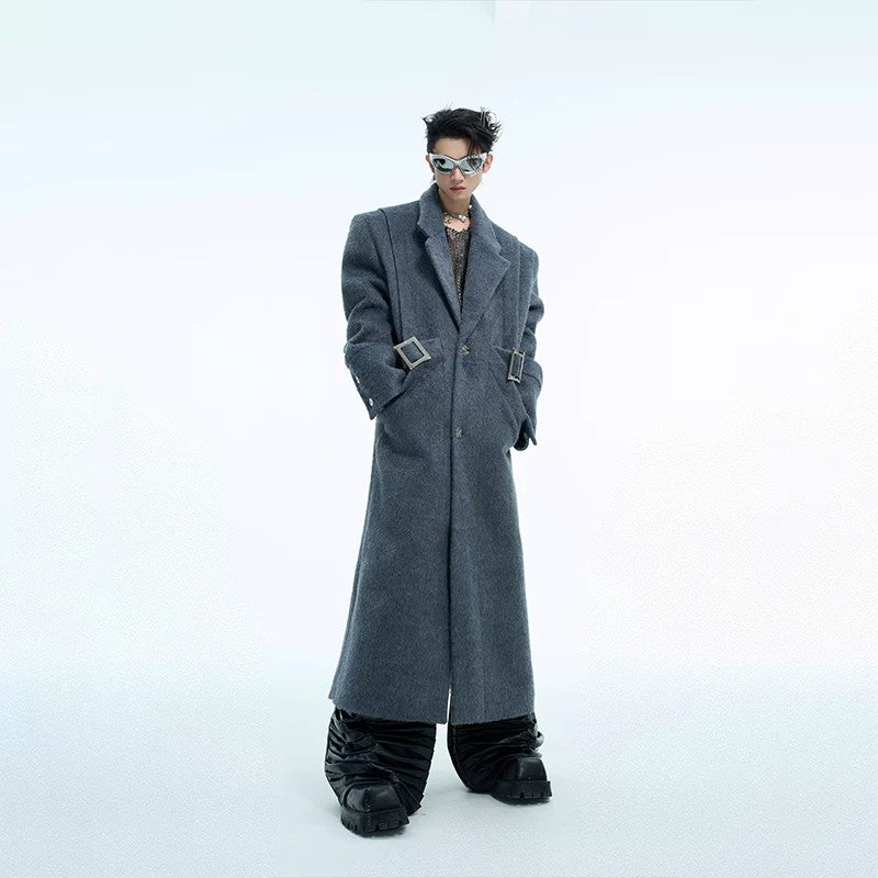 Front view of an oversized deconstructed wool coat in solid color