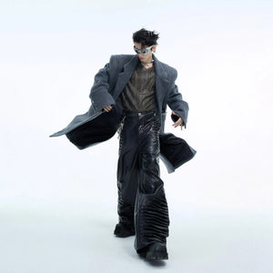 Back view of a belted deconstructed wool coat for men