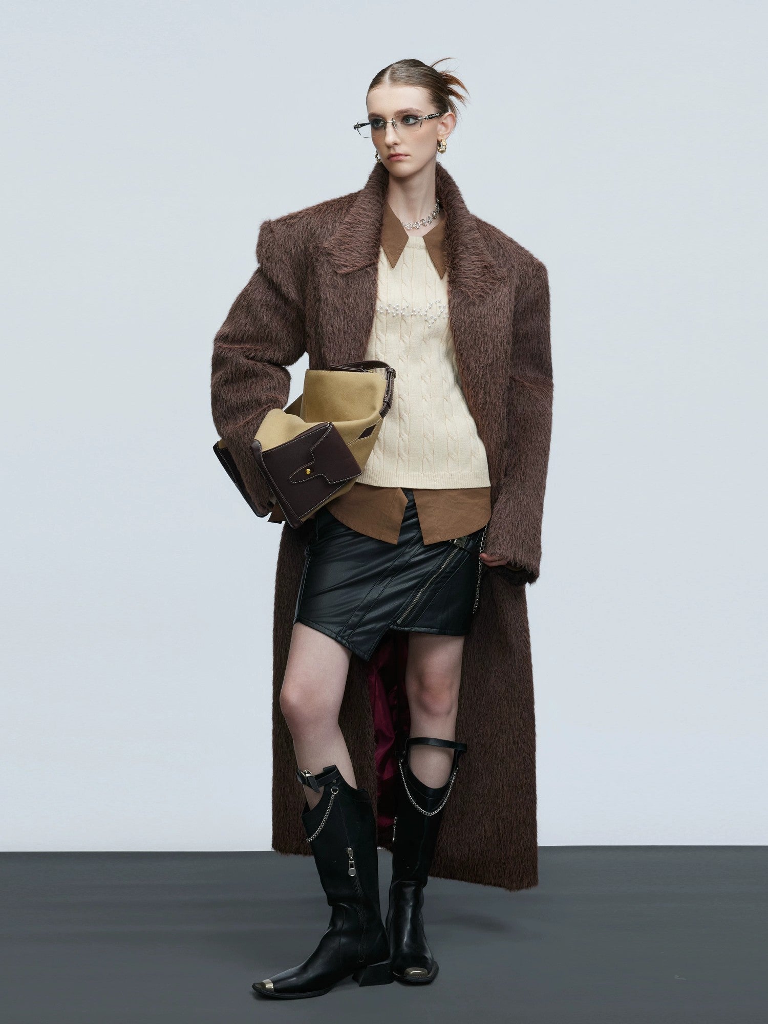 Close-up of amber textured buttons on an alpaca wool coat