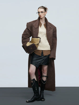 Close-up of amber textured buttons on an alpaca wool coat