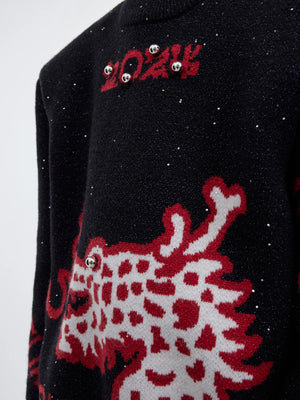 Back view showing the loose deconstructed fit of the streetwear sweater
