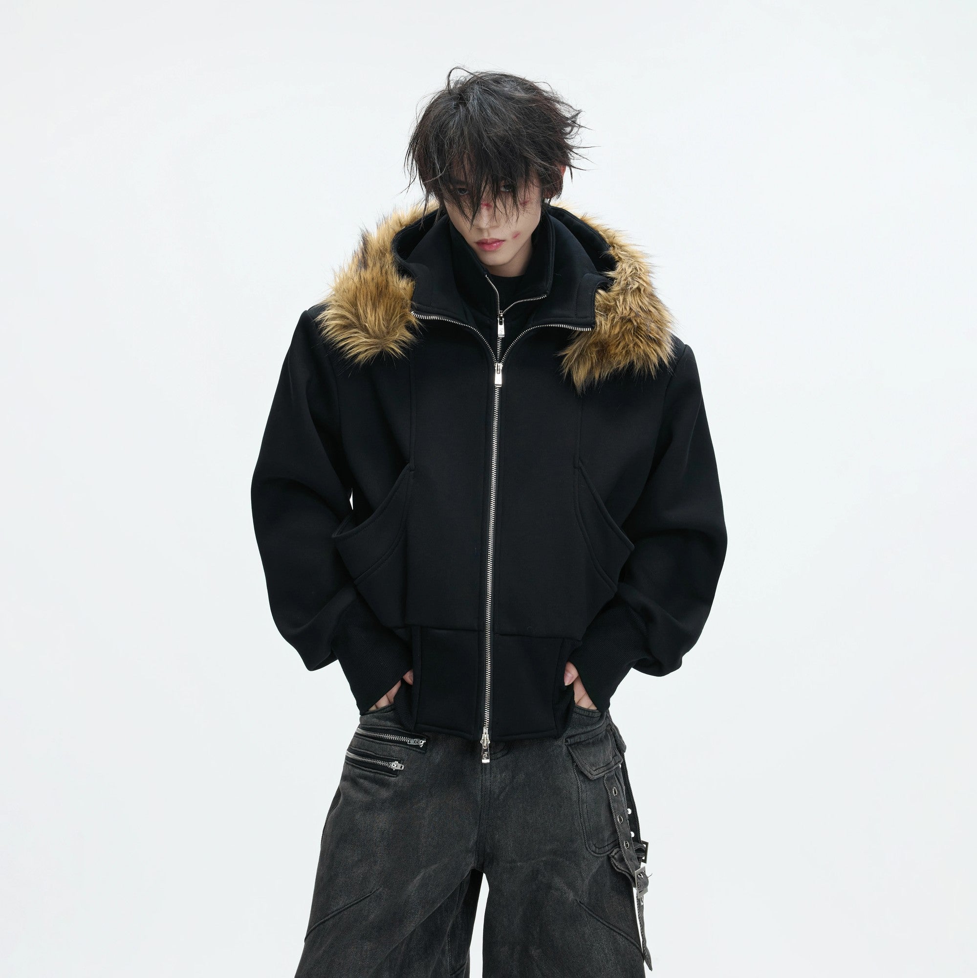 Front view of black deconstructed streetwear hoodie with zipper