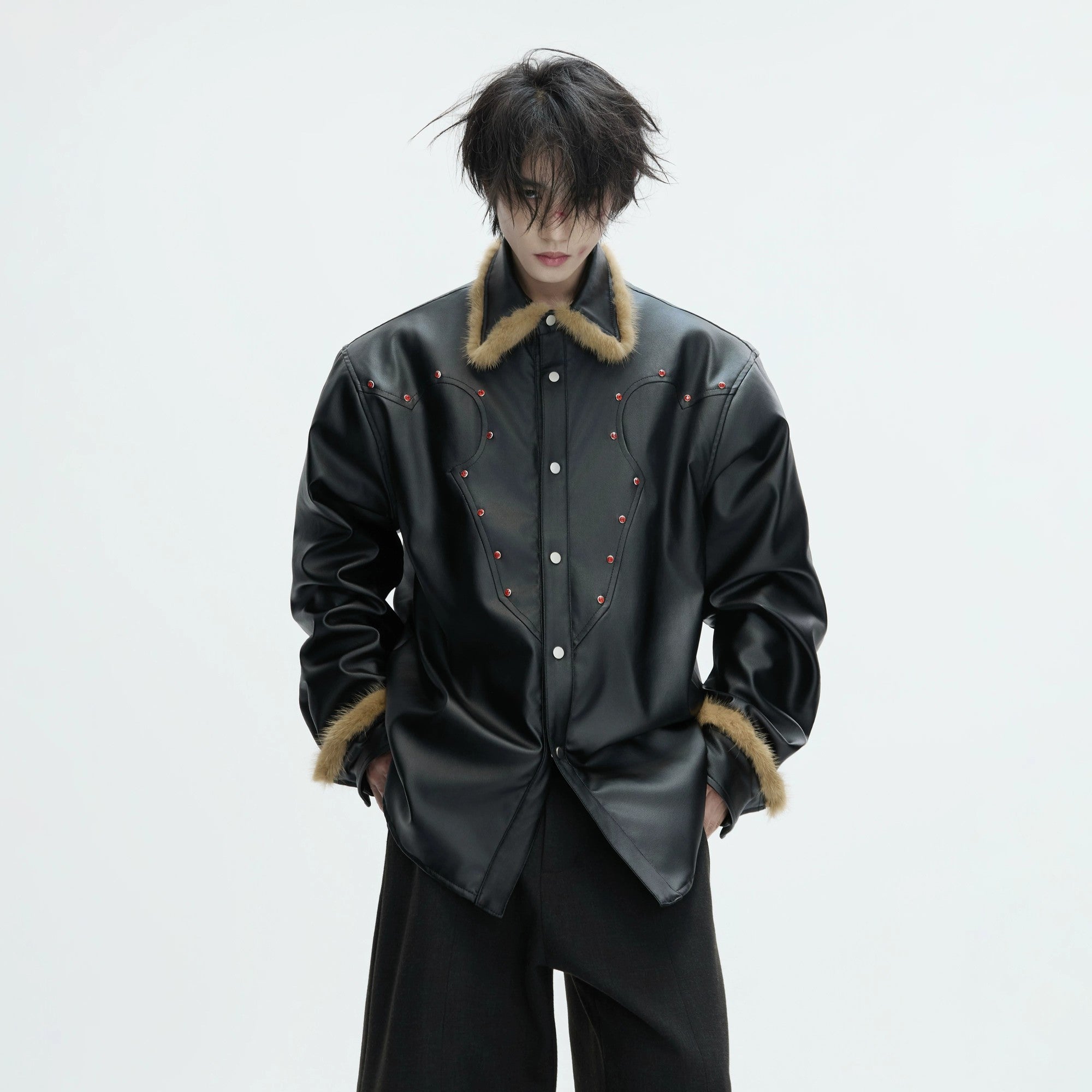 Close up of the deconstructed stitching and vegetable-tanned leather texture.