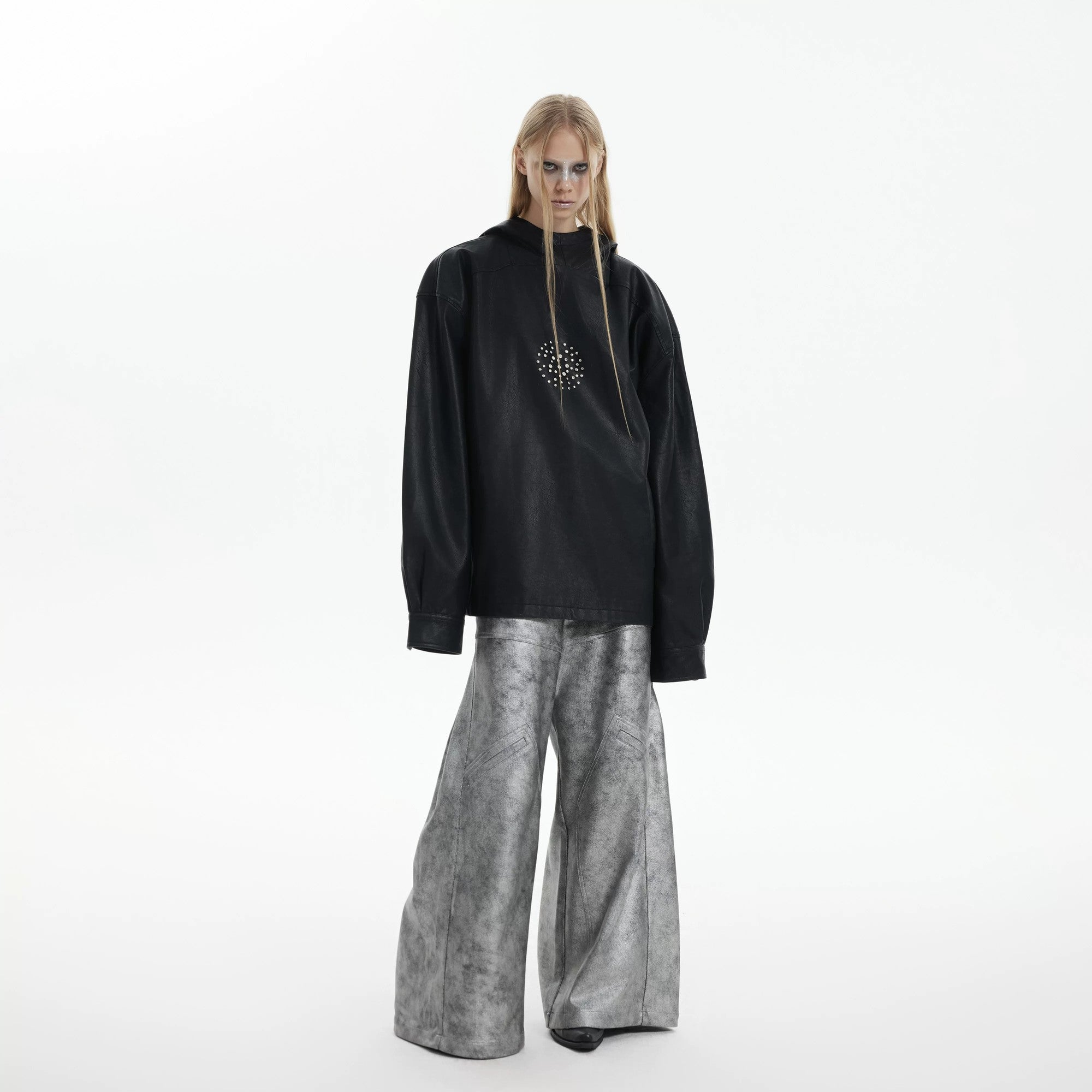 Back view of a boxy fit black leather hooded sweatshirt