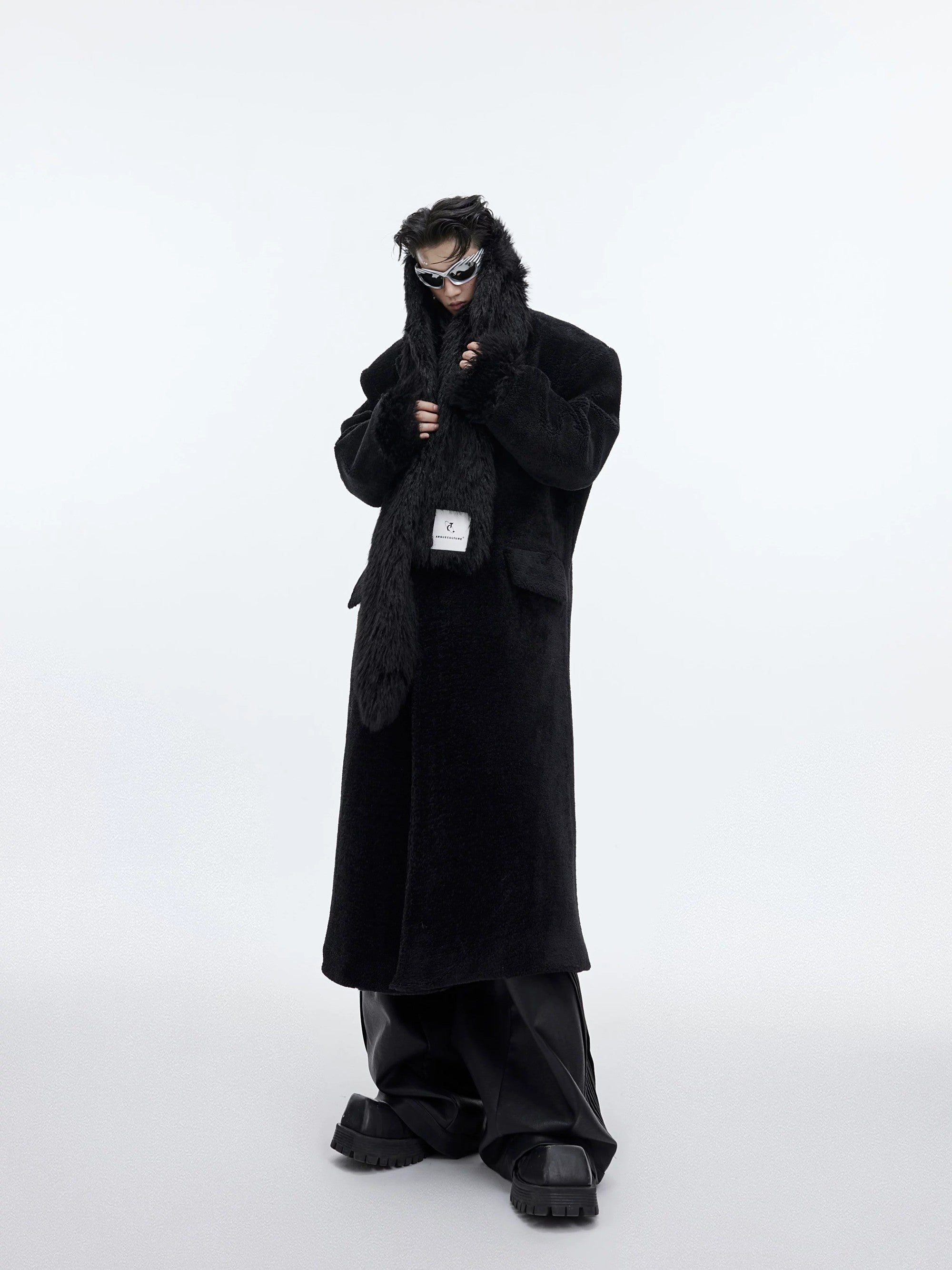 Back view of long cocoon style wool coat for men
